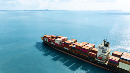 Aerial view of the freight shipping transport system cargo ship container. international...