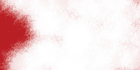 Red textured surface with soft artistic cloud of white spray

