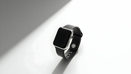 Blank white screen Smartwatch in split-tone shadow setup, left side brightly lit and right softly dimmed, 