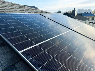 Residential solar panel system on modern house roof