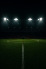 An expansive sports arena with vibrant green grass under stadium lights evokes anticipation.
