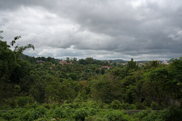 Saen Monourom Hill under a stormy sky