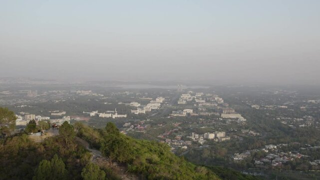 F6 and G6 sectors in Islamabad during evening light, framed by Margalla greenery. Islamabad, Pakistan