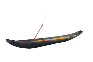 Curved wooden incense holder with white smoke, isolated.
