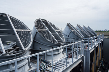 Cooling towers system, Chillers, Induced draft cooling towers on rooftop of building. Heating,...