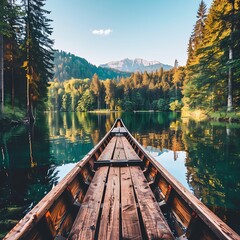Serene lakeside adventure: a wooden canoe journey through emerald waters and towering trees