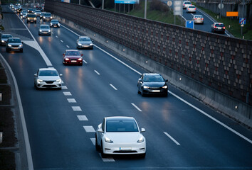 Cars driving on highway in the evening