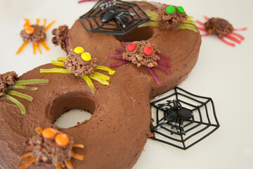 Child's number eight spider birthday cake