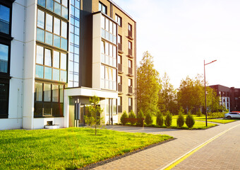 Modern apartment house block. Facade of New modern residential Condo house complex. City apartment building. Condominium building in Cityscape. Modern European residential building apartments.