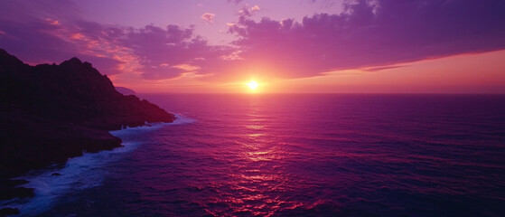 Sunset over the sea with rocky shore. Suitable for articles about nature, travel and vacation at the sea.