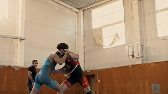 male wrestlers at grecoroman wrestling competition