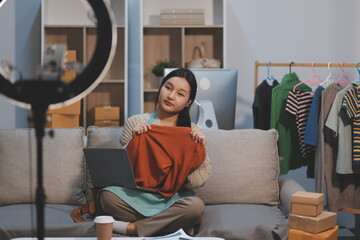Young asian women happy after new order from customer. Surprise and shock face of asian woman...