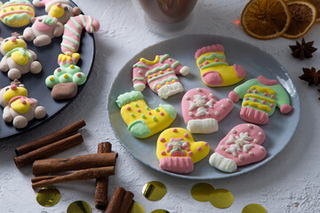 Christmas marshmallows. Winter candy. Sweet food for ugly sweater party in december