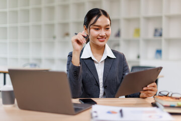 Business woman signs an electronic document on a digital document on a virtual tablet laptop...