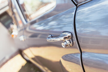 Vintage car abstract detail, door handle