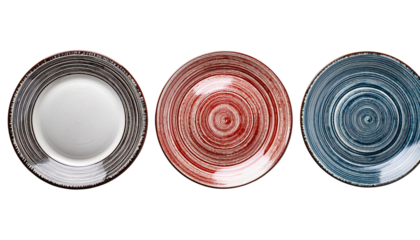 Artistic Tableware Trio: A close-up view of a trio of artistic plates, each showcasing a unique swirling design and rustic texture, adding a touch of elegance to the dining experience.