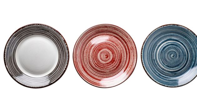 Artistic Tableware Trio: A close-up view of a trio of artistic plates, each showcasing a unique swirling design and rustic texture, adding a touch of elegance to the dining experience.