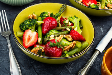 A refreshing asparagus salad with strawberries.