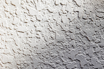 Abstract rough concrete wall texture with light shadows