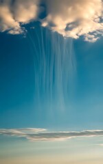 Fototapeta premium Ethereal Rainfall From Clouds in Blue Sky – Virga Weather Phenomenon
