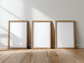 Ai Generated Aesthetic Closeup of Three Gold Brass Blank A4 ISO Paper Wall Art Frames For a Mockup Standing on the Wooden Floor against Minimalistic White Wall