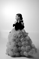 Elegant Young Girl in Dramatic Fluffy Gown