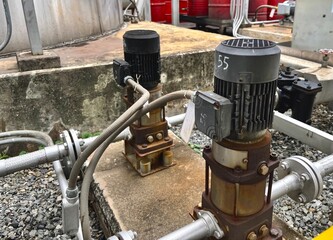 old water pump, Industrial cooling tower with connected insulated pipelines and filters. Essential part of HVAC and thermal systems used in large buildings or factories.