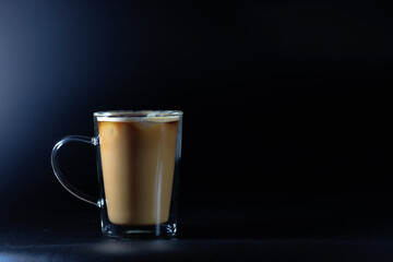 iced latte coffee on a black background