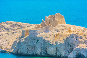 Close-up view of Stone Fort on Pag Island, Croatia, showing the stone structure and historic walls and coastal position, surrounded by the stark rocky terrain and clear Adriatic waters