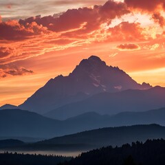 Fototapeta premium Sunset view over mountain landscape with glowing sky and clouds