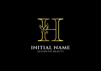 Initial H Letter Logo Design with Butterfly or Leaf Element