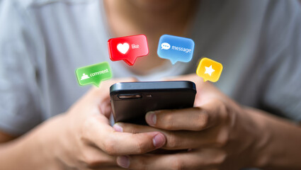 Child using social media, holding smart phone with icons of like, comment, star over it. Young kid playing on smart phone. children's cybersecurity, social media addiction, communication