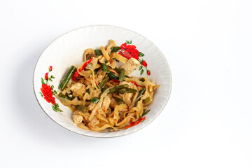 Spicy mushroom stir-fry with tofu and water spinach served in a plate