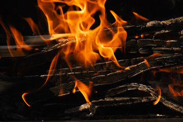 Night campfire,big bonfire against black background. Sparks of bonfire and fire. Close up