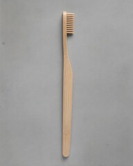 Light brown bamboo toothbrush