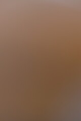 Abstract blurred color gradient background in soft warm tones