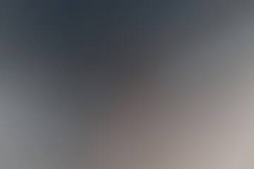 Abstract gradient background with smooth transition from dark to light shades