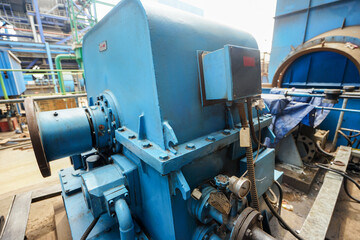 Industrial motor boiler blower fan machinery inside a power plant