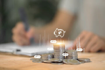 Stacks of coins are displayed with digital data charts and a piggy bank icon, visualizing the...