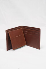 Dark brown genuine leather wallet with multiple card slots and a coin pouch, practical and stylish.
