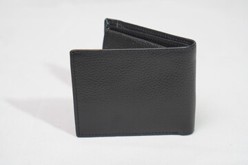 Black genuine pebbled leather bifold wallet, offering sleek style and practical organization.