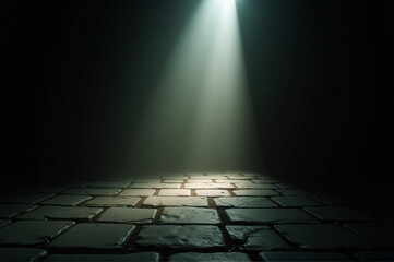 A dark room with a light shining on the floor.