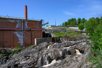 Fragment of a brick hydroelectric power plant building of the early 19th century in Lyaskelya, Karelia