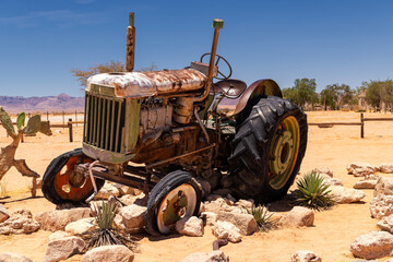 old tractor parked in the desert, namibia