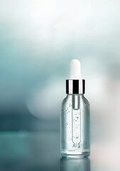 Beautifully serum bottle on blue