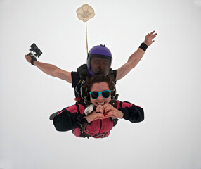 A tandem skydive into the clouds