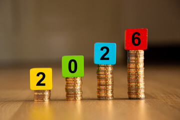 Coins stack growing in 2026 showing economic progress