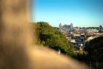 Golden hour sunset with beautiful warm cityscape of Rome, Italy. © vojta