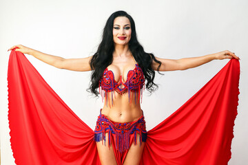 Elegant Eastern Dancer Gracefully Holding the Edges of Her Skirt Captivating Performance.