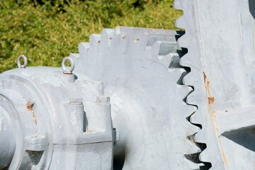 Close-Up of Old Grey Giant Gear Wheels